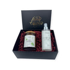 Kerstcadeau met handgemaakte geurkaars Pure Balance en Eucalyptus Den roomspray in luxe cadeauverpakking.
