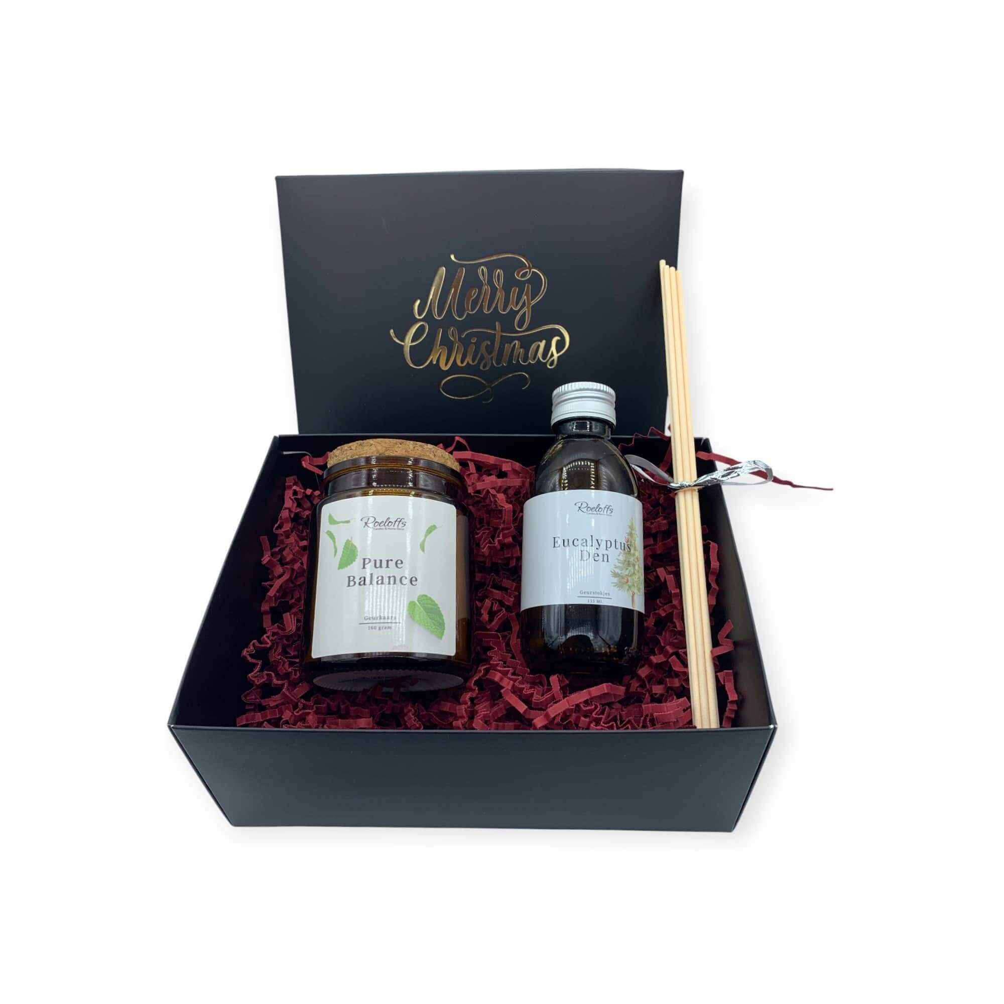 Kerstcadeau met geurkaars Pure Balance, roomspray en geurstokjes in een elegante geschenkdoos.
