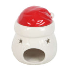 Close-up keramische waxbrander kerstman – vrolijke limited edition kerstdecoratie