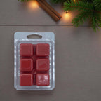 Waxmelt Christmas Night in a clamshell packaging, featuring six red wax cubes, ideal for festive ambiance.