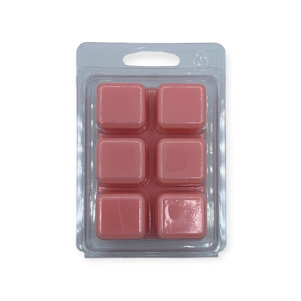 Waxmelt Christmas Fair in pink wax cube form, showcasing limited edition fragrance.