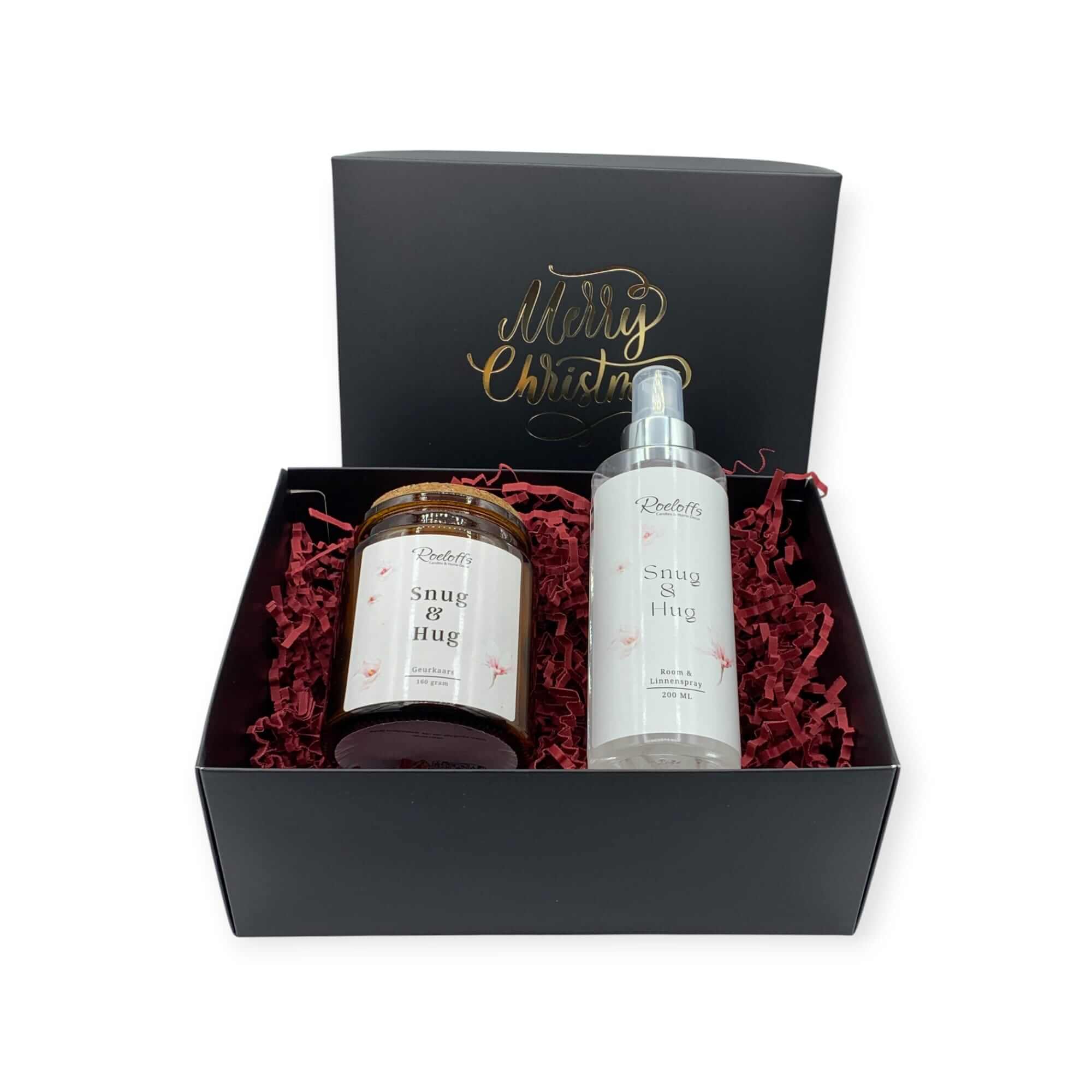 Kerstcadeau Rust met geurkaars Snug & Hug en roomspray in stijlvolle verpakking voor ontspanning.