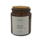 Geurkaars Inner Peace in glazen pot met kurken deksel, perfect voor ontspanning en rust.