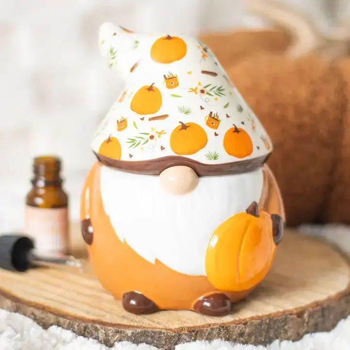 Waxbrander gnome met pompoen